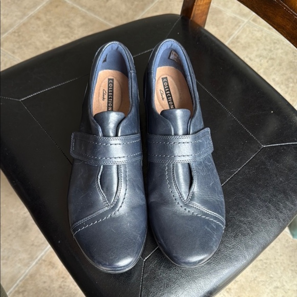 Clark’s black loafers flat collection
